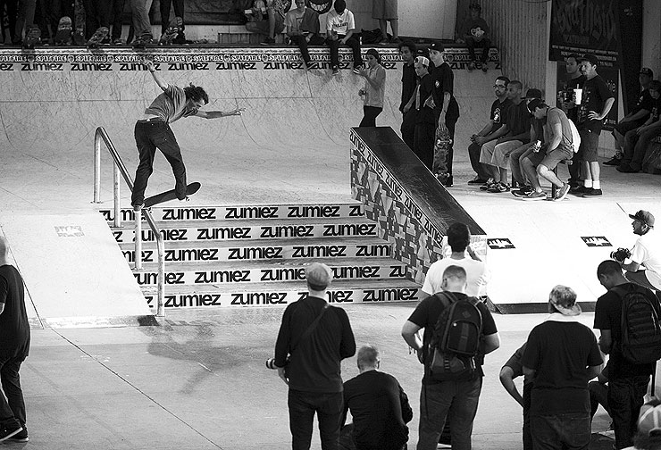 Evan back tails the handrail during the Zumiez Best Trick.